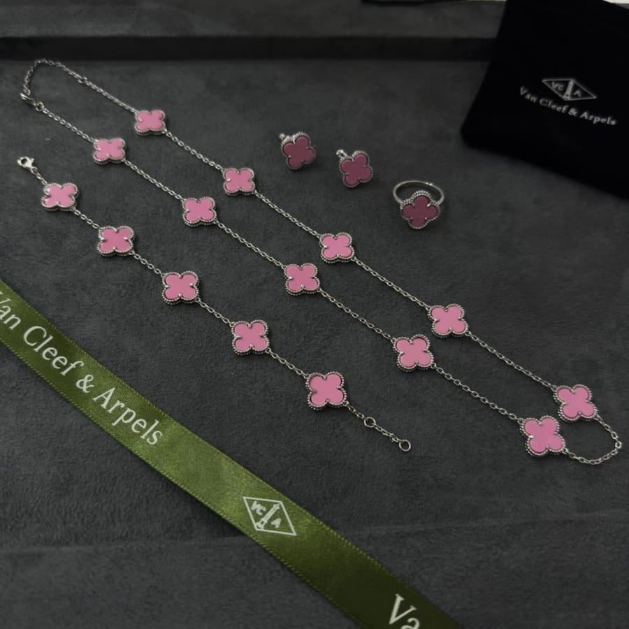 Van Cleef sets, 10 silver roses