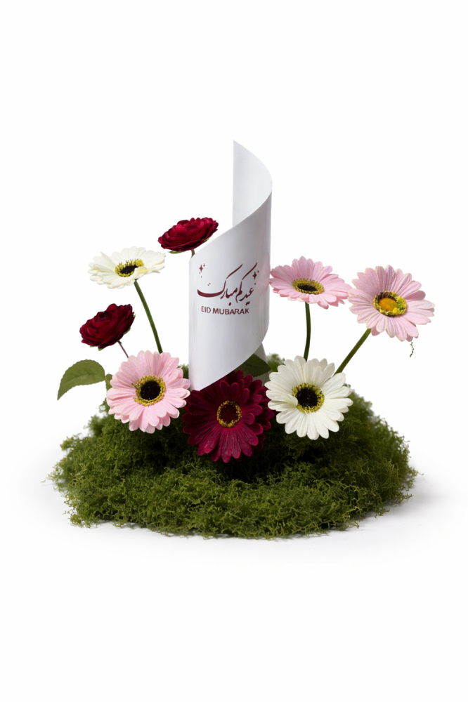 فازة ورد مع عبارة عيد