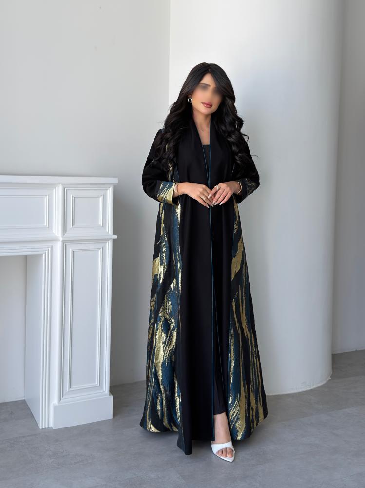 عباية كريب كتان كلوش بدخلات جاكار ذهبي وزيتي من متجر Seventy One