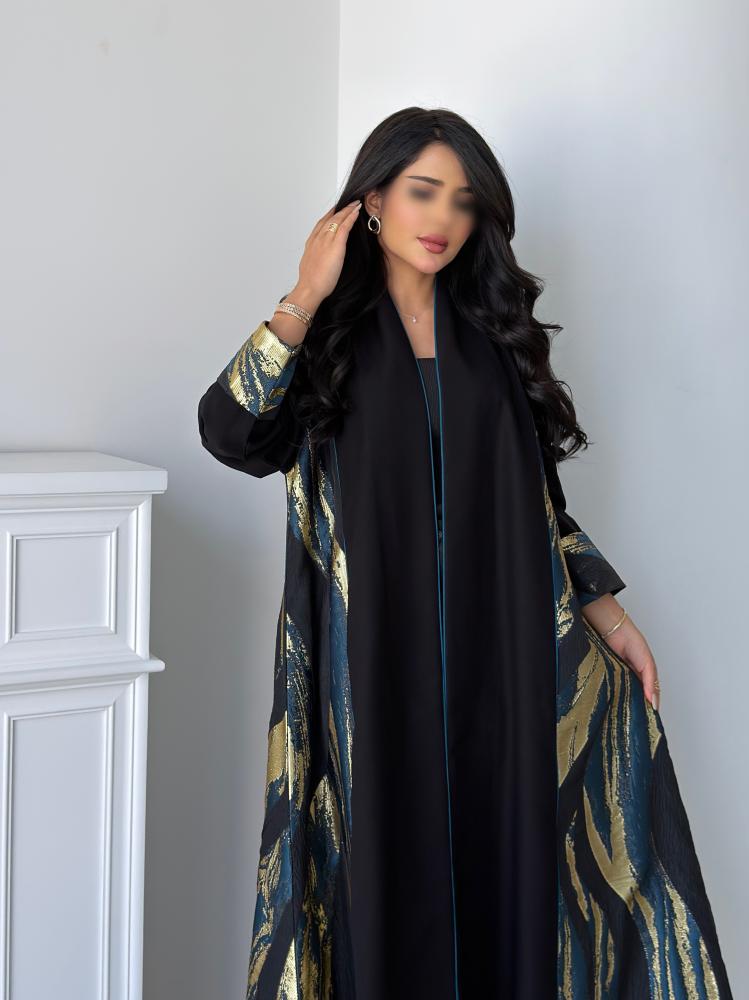 عباية كريب كتان كلوش بدخلات جاكار ذهبي وزيتي من متجر Seventy One