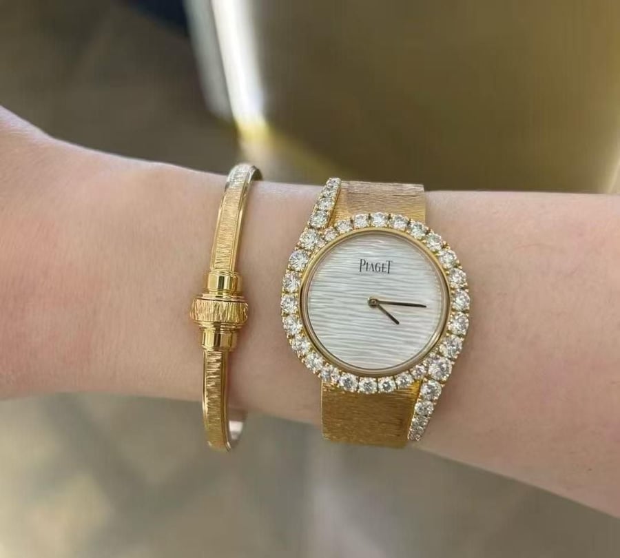 A Pegat Master Quality Gold Pearl watch