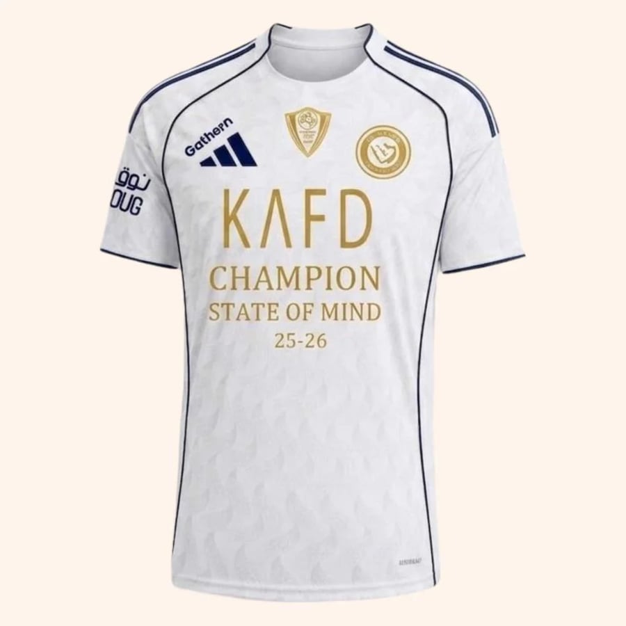 تيشيرت تتويج النصر الابيض الذهبي 2026