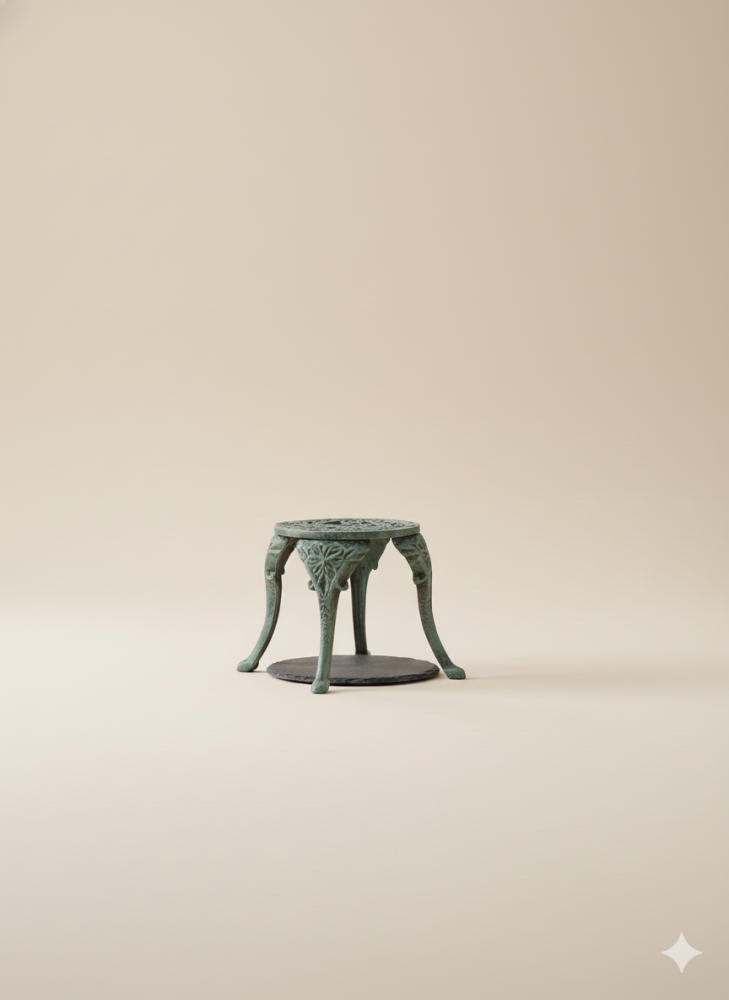 Metal table with Victorian design