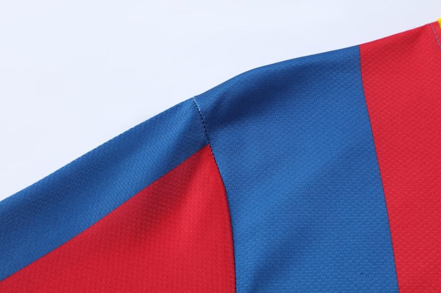 تيشيرت برشلونة 10/11 الاساسي