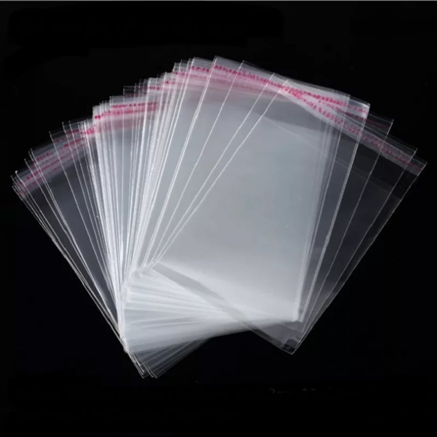 اكياس شفافه لاصقه  وطني تزن 500جرام مقاس15*15