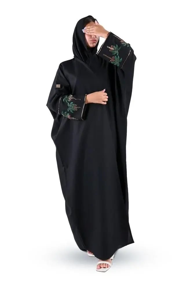 عباية كريب بكم اسود وتطريز يدوي سيفين ونخلة