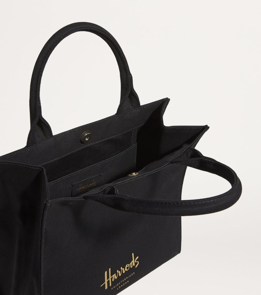 شنطة يد Harrods هارودز الأصلية 100% من شركة هارودز لندن - قطن أسود سادة بشعار ذهبي،، حجم صغير،
