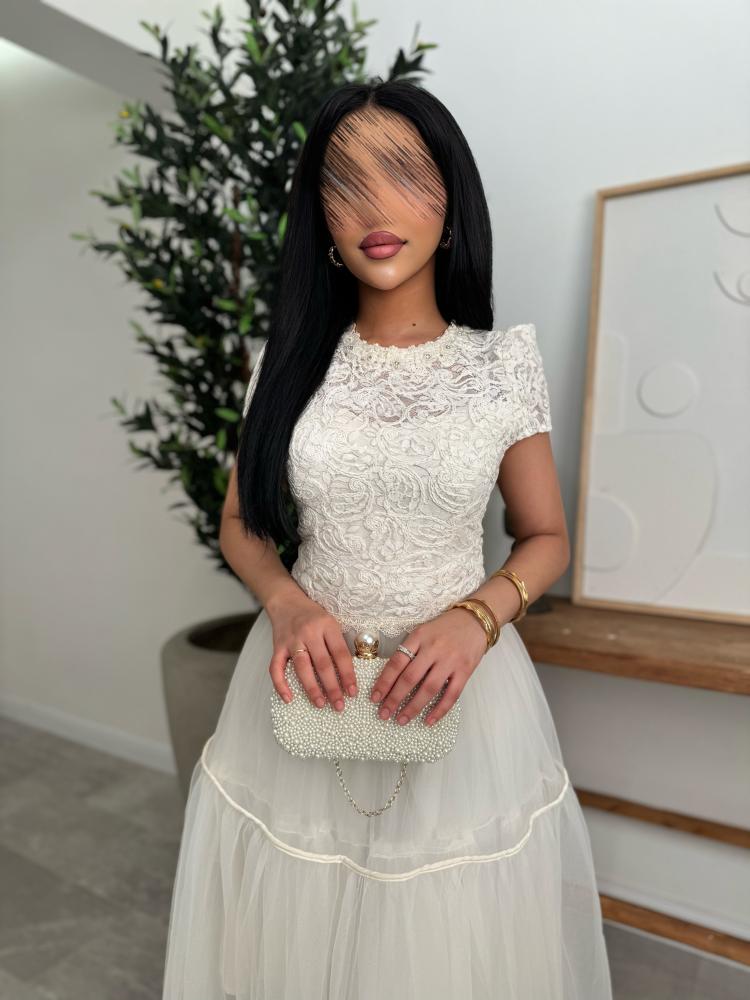White lace dress in the form of a set