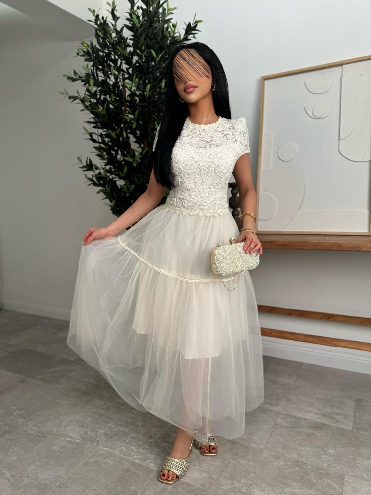 White lace dress in the form of a set