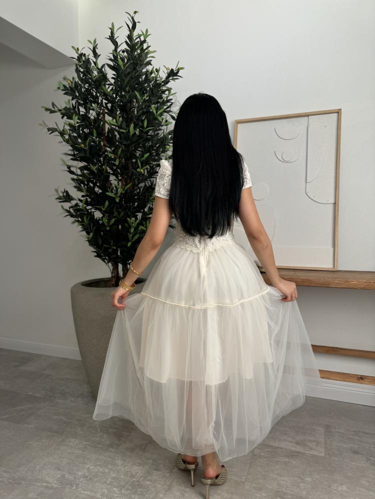 White lace dress in the form of a set