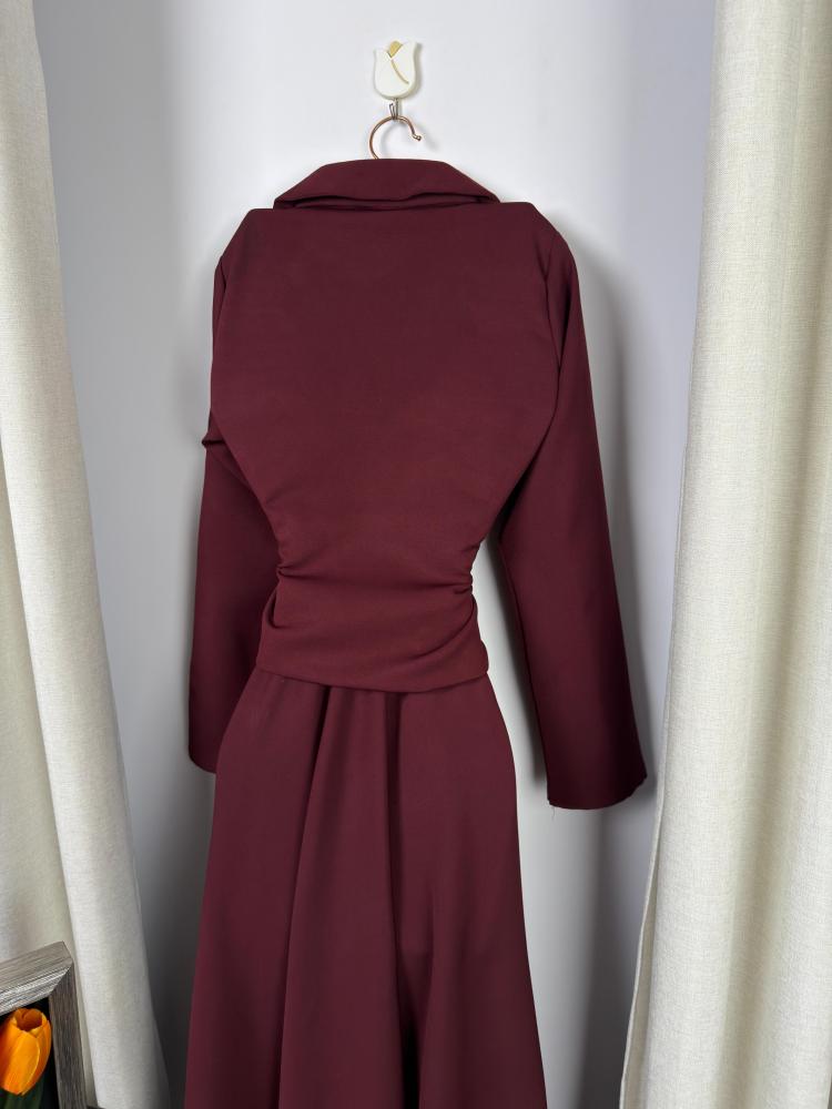 Two pieces of Burgundy baby clothes