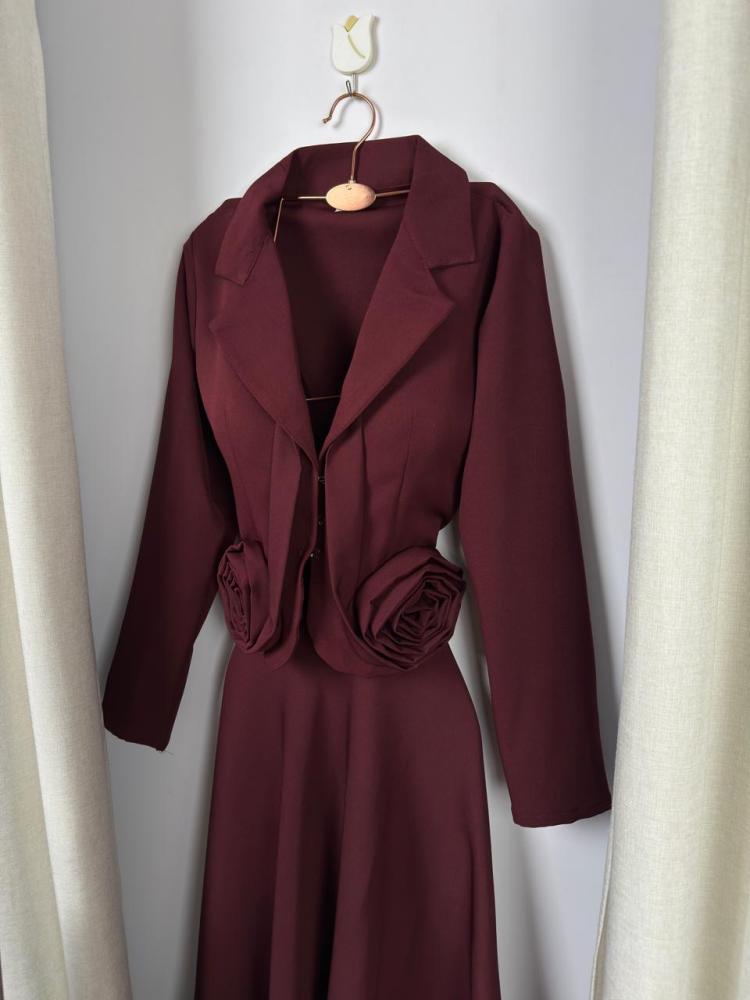 Two pieces of Burgundy baby clothes