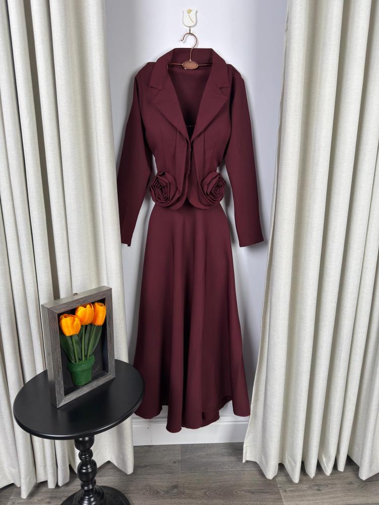 Two pieces of Burgundy baby clothes