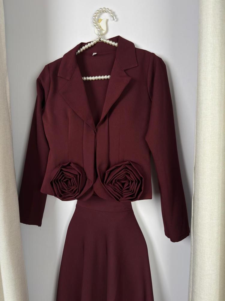 Two pieces of Burgundy baby clothes