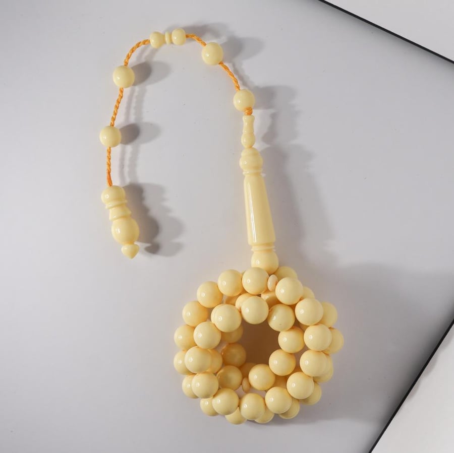 A prayer bead with a shell similar to Duma with a Tameelika