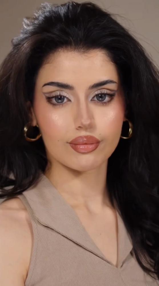 عدسة (zoom )