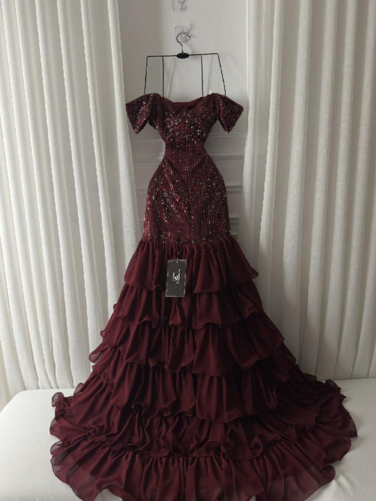 Burgundy dress with a beaded bodice and layered georgette
