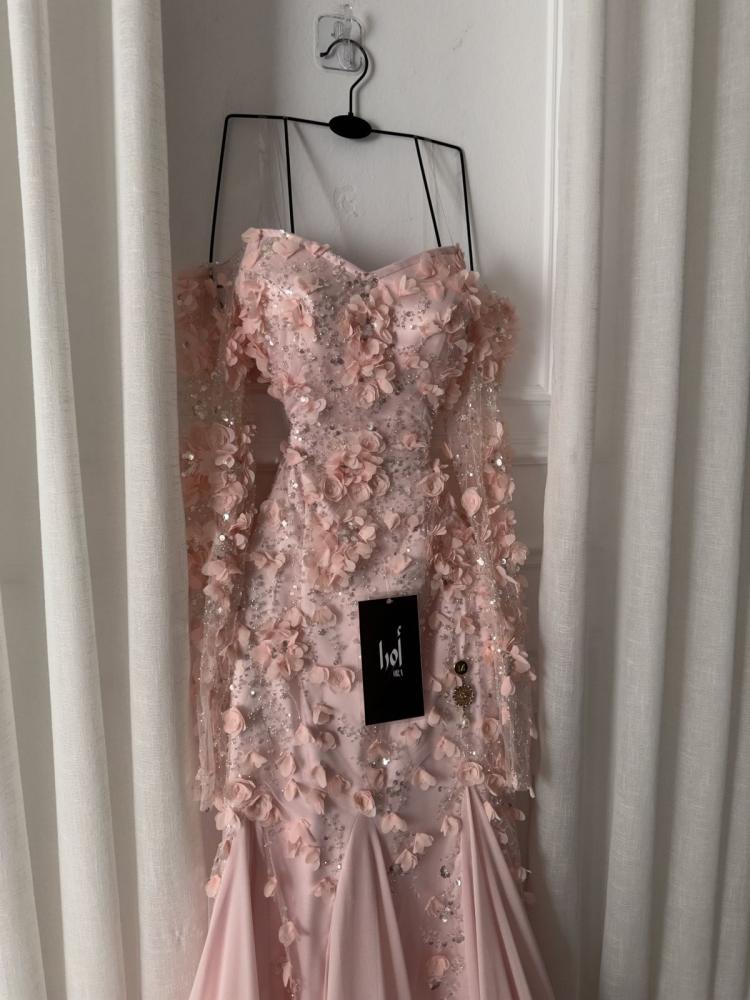 Pink dress, its inserts were made by a supplier of georgette