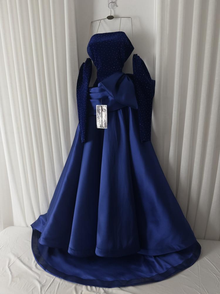Navy blue dress with a wool bodice and Mikado waist pleats and frills