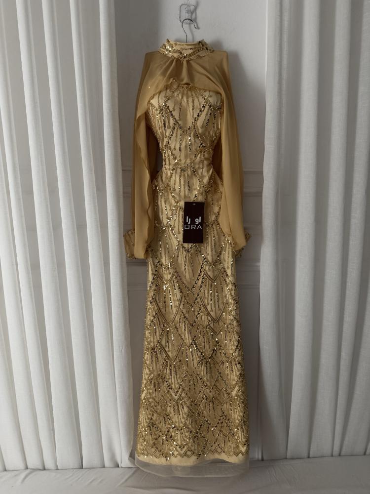 A gold dress with sequins and a separate georgette jacket