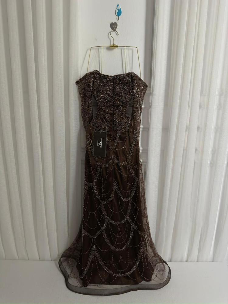 Mocha dress with elegant embellishments, perfect for an evening out