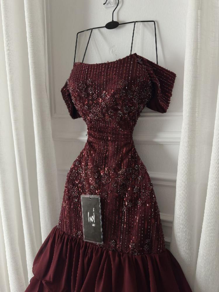 Burgundy dress with a beaded bodice and layered georgette