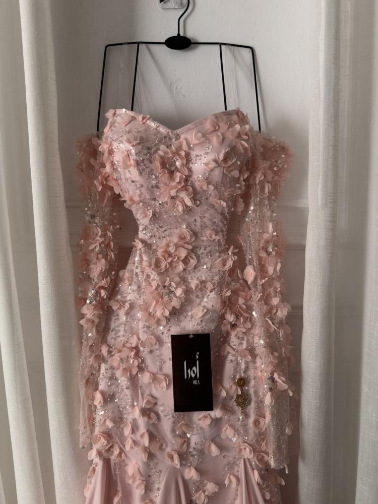 Pink dress, its inserts were made by a supplier of georgette