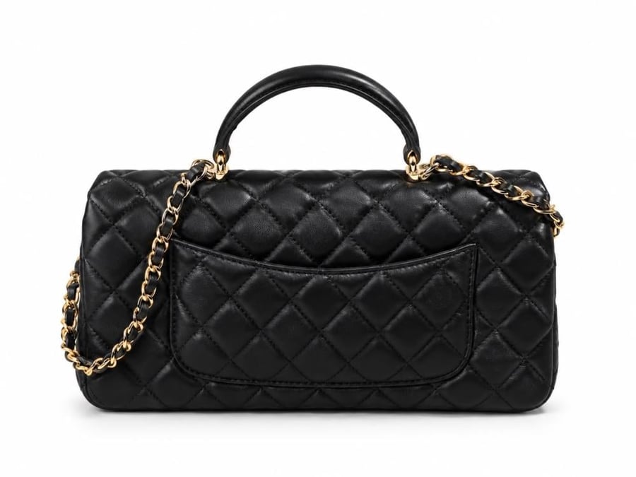 chanel qulited long top handle bag