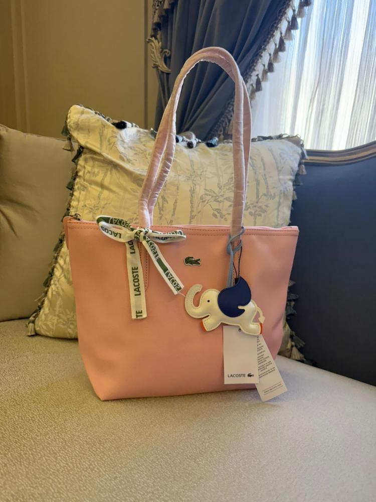 Dark pink Lacoste bag
