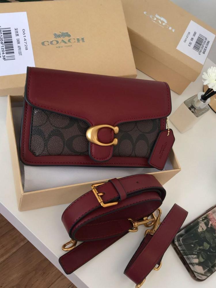 Women's bag of a well-known brand, same as the picture, with accessories