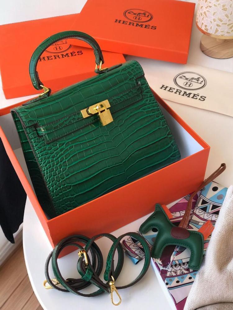 Women's bag of a well-known brand, same as the picture, with accessories