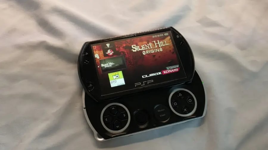 PSP Go — أسود مع العاب