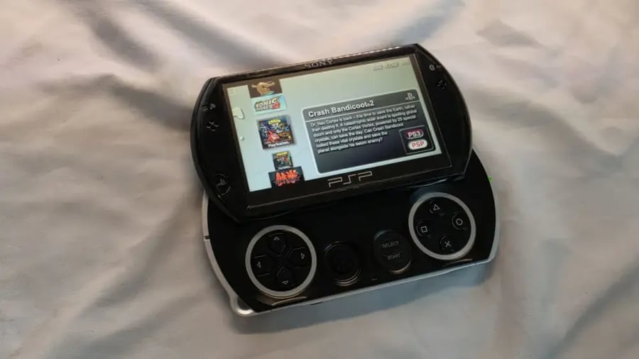 PSP Go — أسود مع العاب