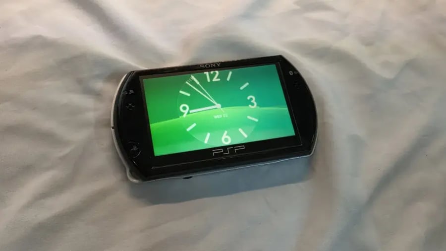 PSP Go — أسود مع العاب