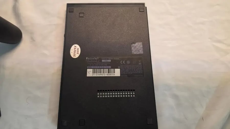 PlayStation 2 Slim — مع شنطة وملحقات