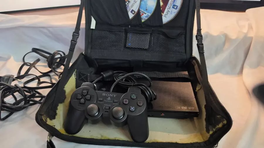 PlayStation 2 Slim — مع شنطة وملحقات