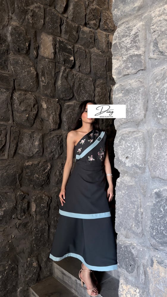 A dress with a side cut from the shoulder