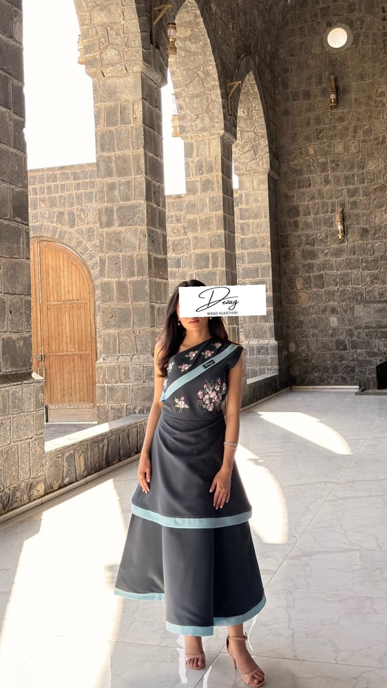 A dress with a side cut from the shoulder