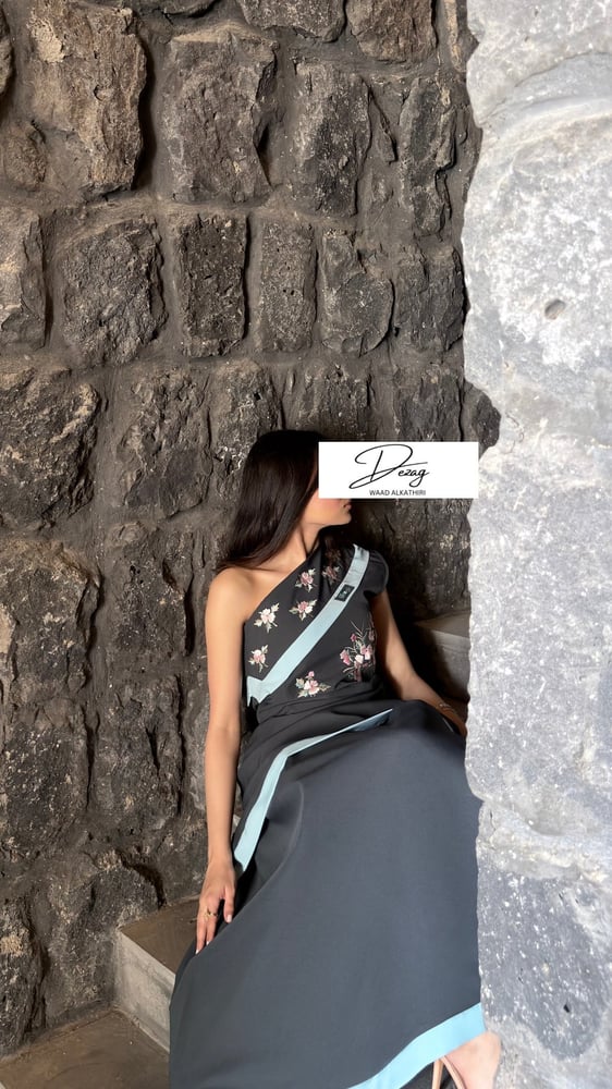 A dress with a side cut from the shoulder
