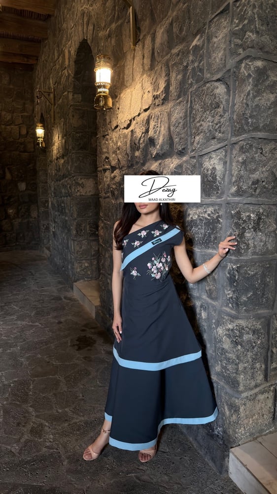 A dress with a side cut from the shoulder