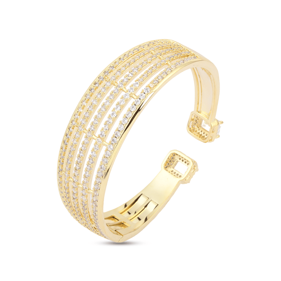 A gold-plated bracelet decorated with glowing crystal