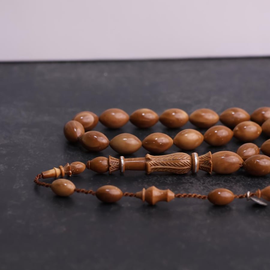 مسباح كوك مع حلقات من الفضة لقطة قريبة
