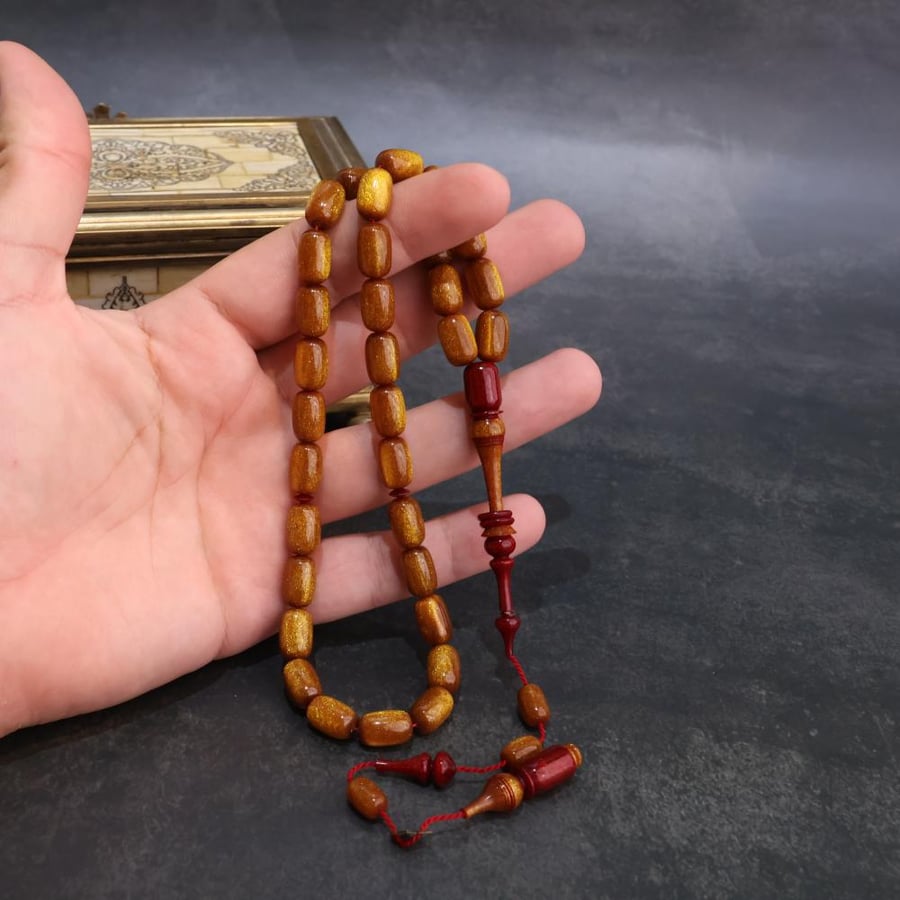 سبحة أنيقة من البكلايت الذهبي اللامع