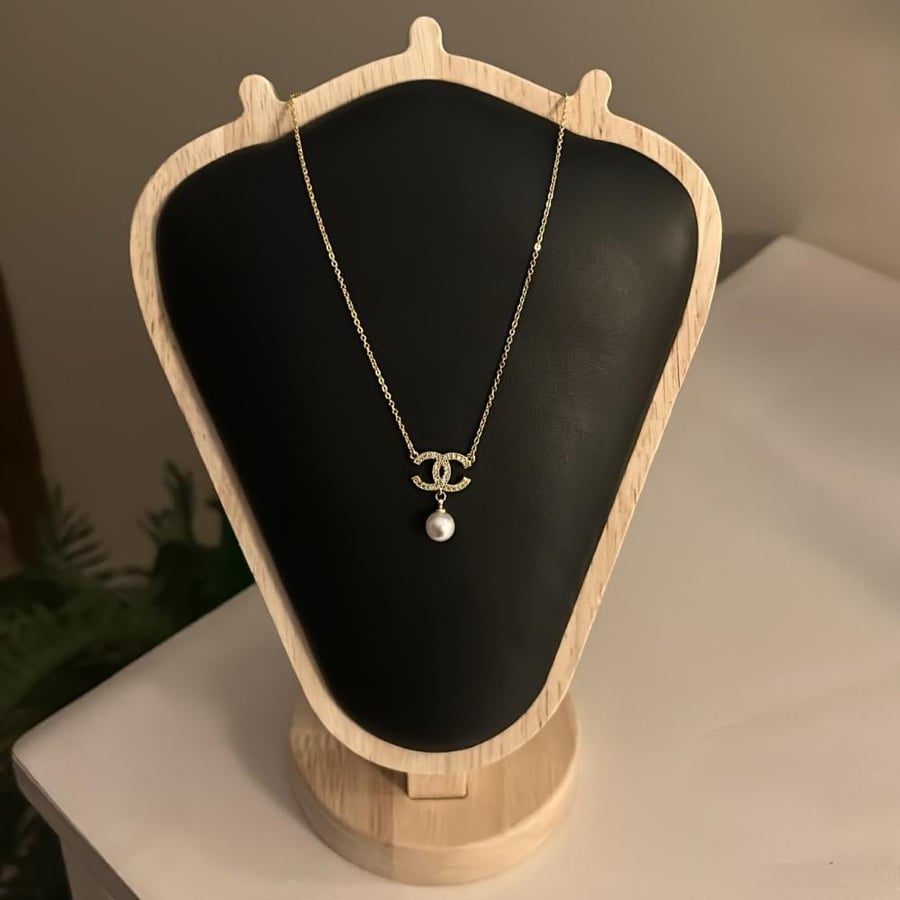 Package of earrings, necklace, and bracelet, Chanel tennis, gold