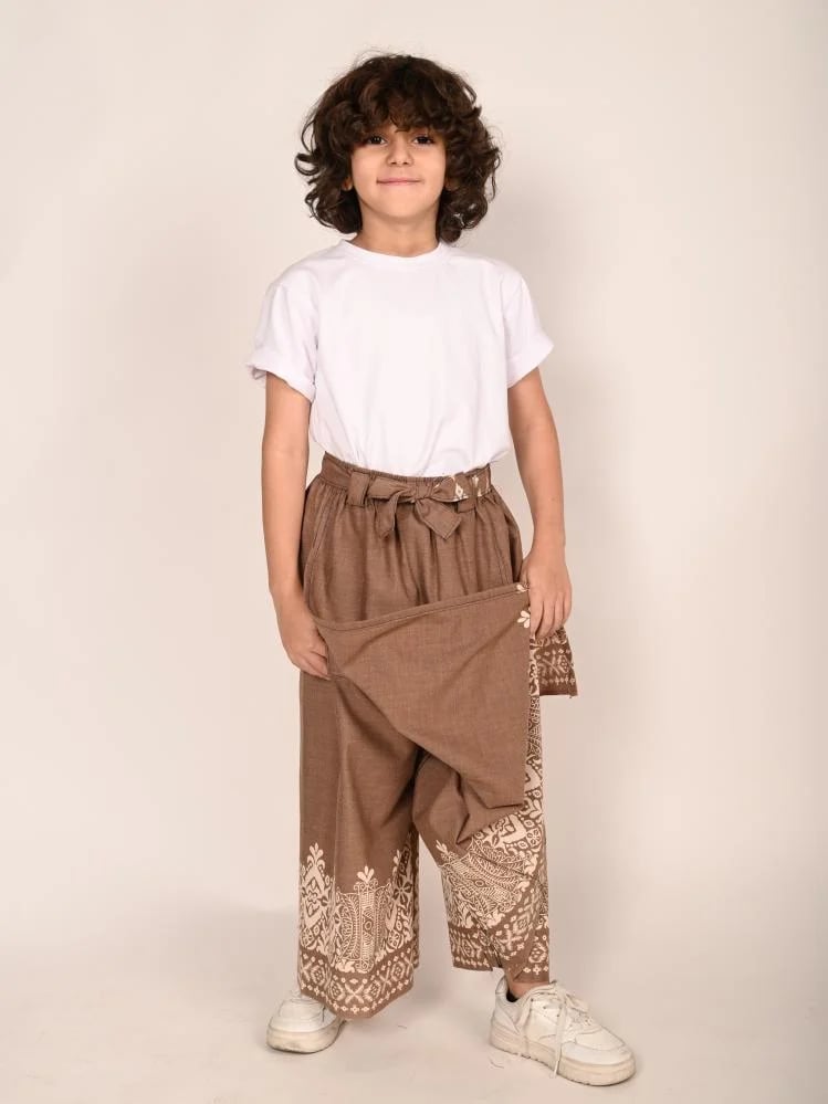 A children's belt with a light brown pattern.