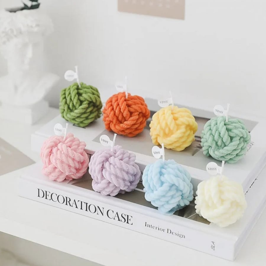 Wool spinning candles