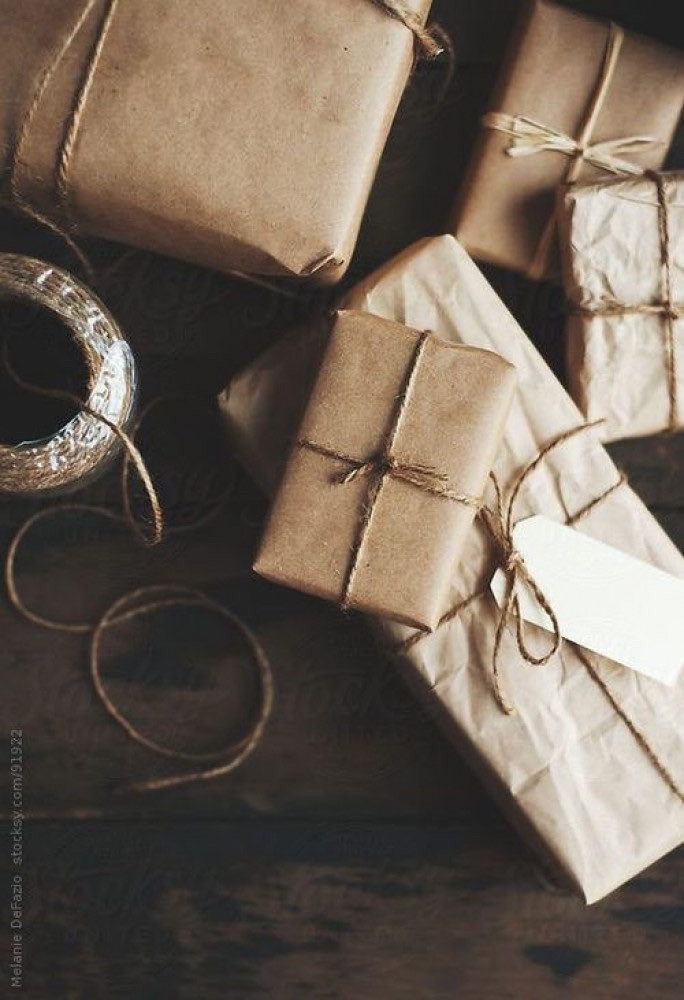 Gift wrapping with brown paper and brown burlap ribbon
