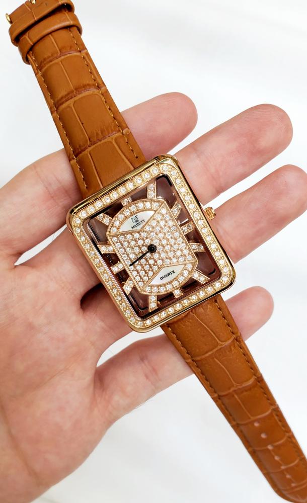 ساعة ماجستي السويسرية انالوج كوارتز( فصوص زركون ) (SWISS MADE) مقاس 38mm جلد بني للجنسين - فنتج