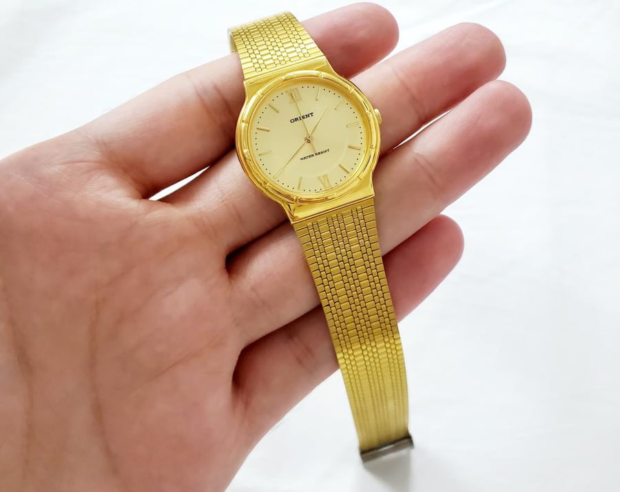 ساعة اورينت اليابانية (1980 م) انالوج كوارتز مقاس 30mm-32mm ستانلس ستيل ذهبي للجنسين - فنتج