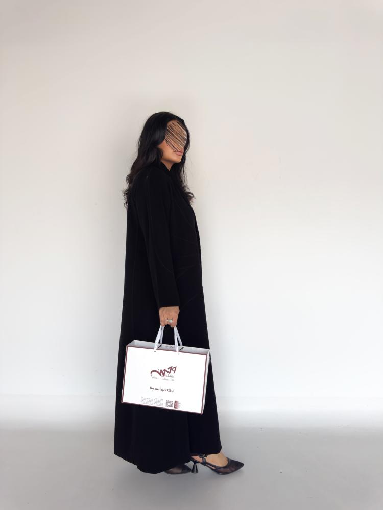 Formal blazer abaya with precise stitching, made of Indonesian ceramic fabric